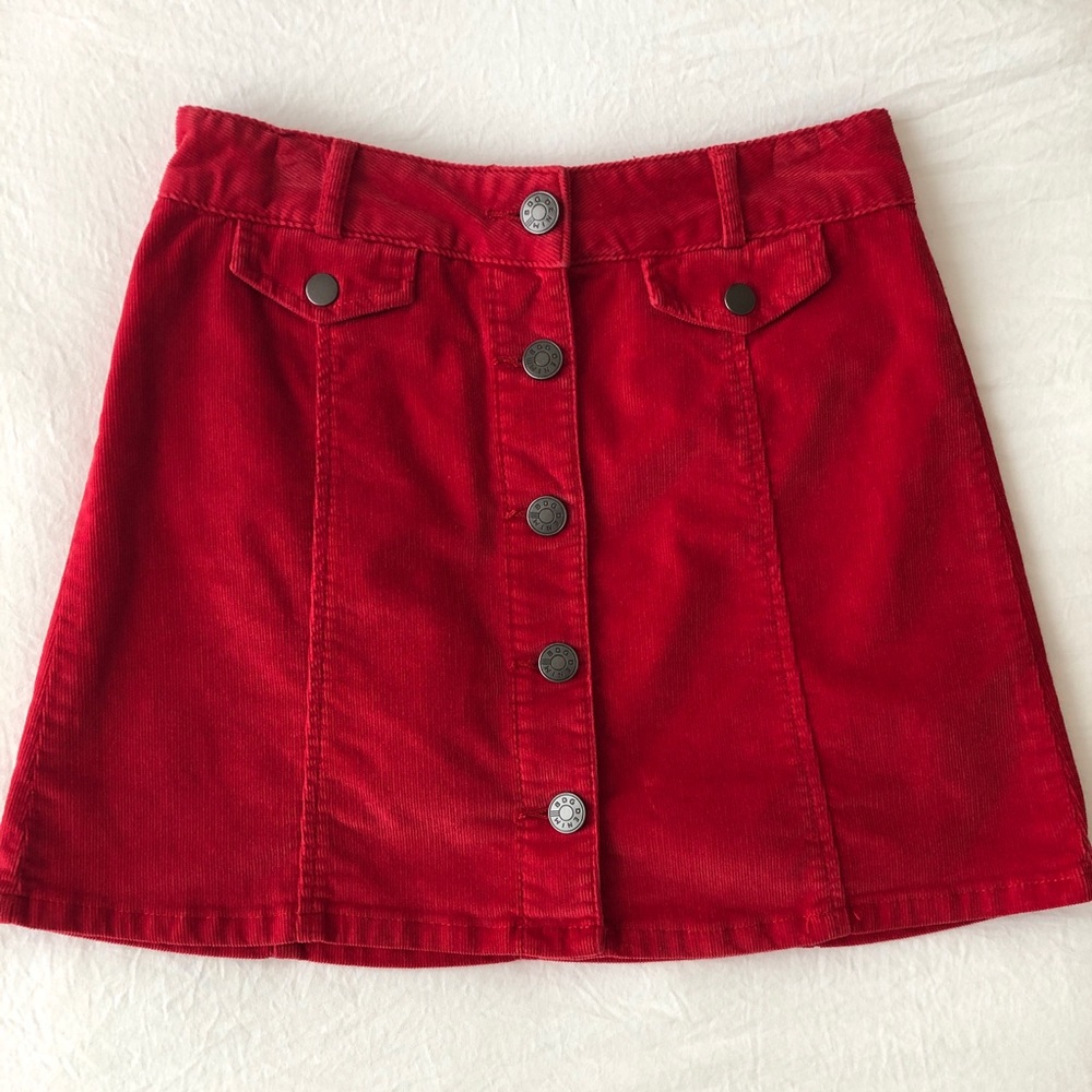 Red corduroy mini skirt with buttons